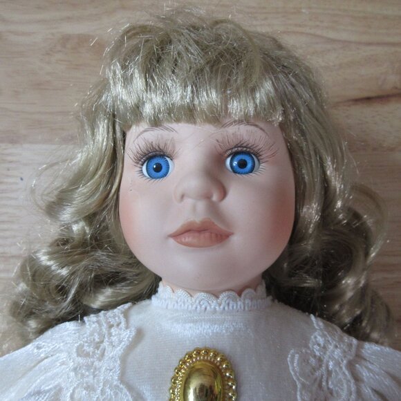 Americana Collection 17" Porcelain Doll - Isabel Christmas Doll - Picture 3 of 9